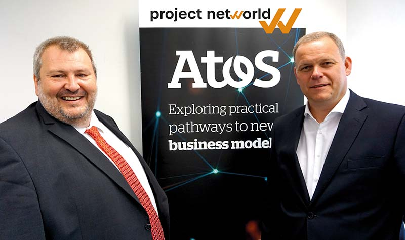 Foto: Mit der Kooperation von Project Networld, Atos und der TU Wien wollen Robert Hauptmann (r.) und Fritz Hödl der Digitalisierung in der Bauwirtschaft auf die Sprünge helfen. 