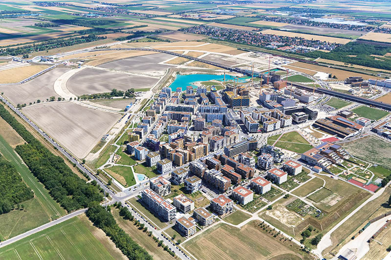 Energiewende findet Stadt: Sektorübergreifende nachhaltige Energielösungen werden vor allem im urbanen Raum klimafreundliches Wirtschaften ­ermöglichen – so auch im "Living Lab" Seestadt Aspern in Wien.